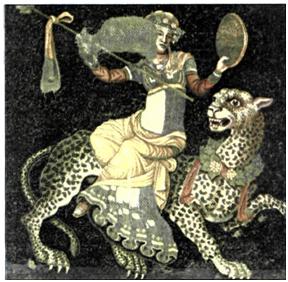 Ψηφιδωτό από οικία της Δήλου (2ος αι. π.Χ.). Παρουσιάζει το θεό Διόνυσο με γυναικεία ρούχα να κρατάει θύρσο* και  κύμβαλο*. Ο θεός είναι στεφανωμένος, όπως και ο πάνθηρας στη ράχη του οποίου κάθεται. Εντυπωσιακή είναι η πολυχρωμία της σύνθεσης. (Αρχαιολογικός χώρος Δήλου)